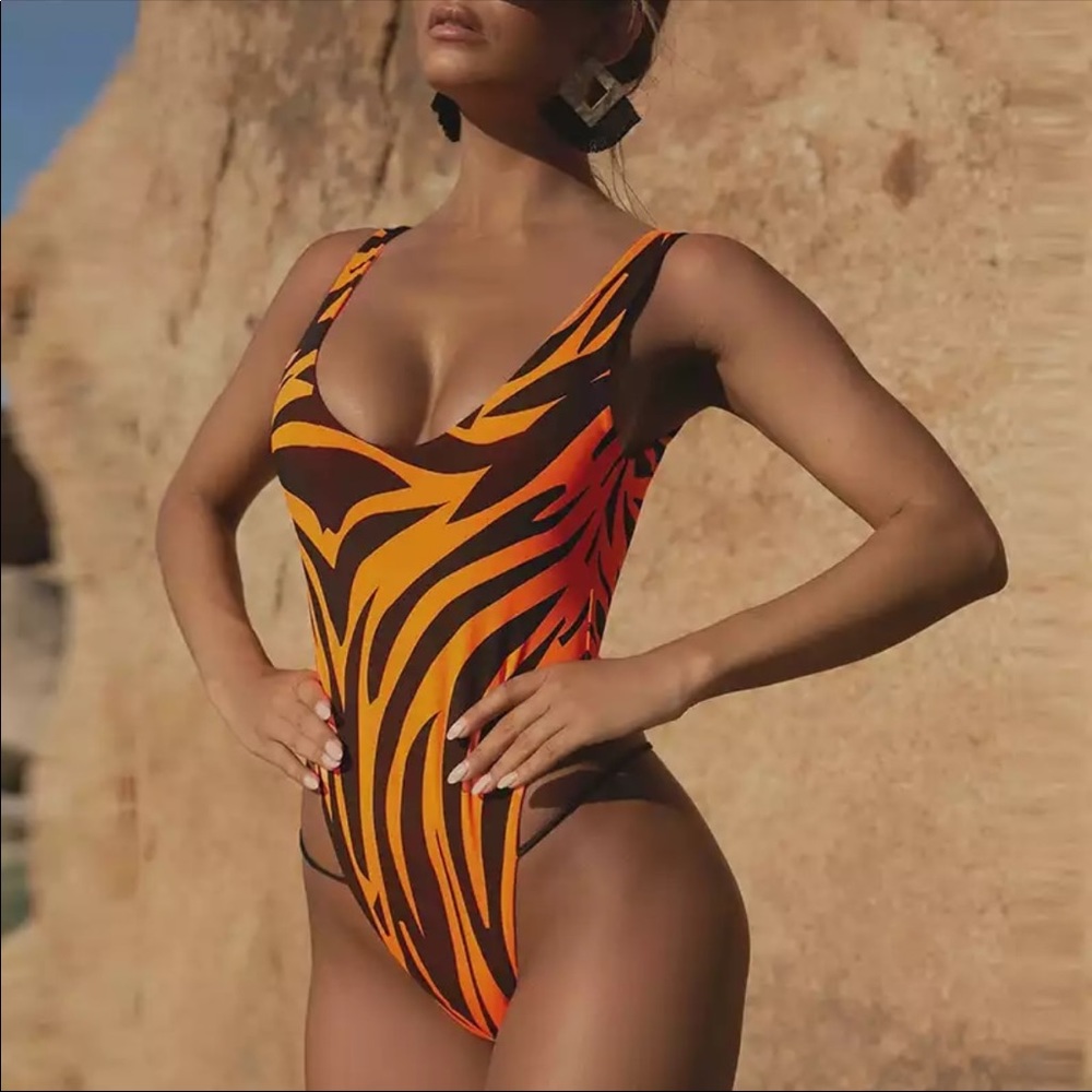 NWOT Orange print tiger print thong one piece